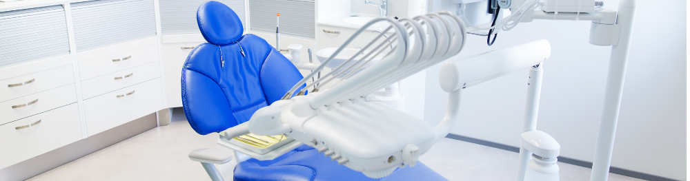 Dental chair in a bright dental office setting